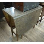 A gateleg drop leaf table. Circa 1950. With a Faux Walnut veneer top. 74 x 134 x 83cm