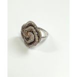 Large 9ct white gold and rose swirling floral diamond ring