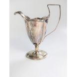 A Sterling silver Cream jug. Thomas Bradbury. London 1904. 15cm high. 115 grams.