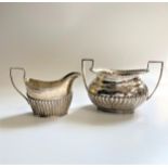 An Edwardian Sterling Silver Two Handled Sugar Bowl. Walker and hall. Sheffield 1908. And a Sterling