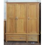 An oak triple wardrobe. Modern. 191cm x 163cm x 58cm.