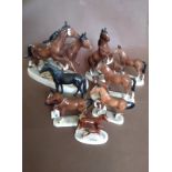 Seven vintage German porcelain studies of horses and foals and one other (8)
