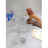 Three Swarovski cut glass dancers 14cm to 20cm, dragon and a unicorn; and a ceramic Simba from