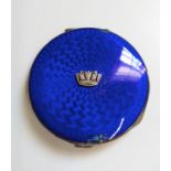 A silver Birmingham 1937 and royal blue enamel AF compact with applied silver Royal Navy crown