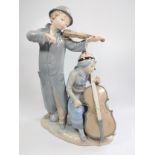 Nao boy violinist and girl double-bass players group 23cm wide by 33cm high.