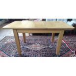 An oak extending dining table 78cm x 125cm x 90xm (with option of 40cm extending leaf)