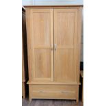 An oak double wardrobe. Modern. 191cm x 110cm x 58cm.