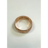 A 9 carat yellow Gold Wedding band. Size 9and a half. 3.41grams.