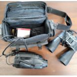 A Pair of binoculars, a canon Video camera with bag. (2)