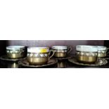 Five porcelain and metal cups with saucers (5)
