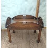 A mahogany butler's table. 55 x 78 55cm.