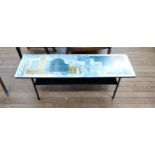 A Printed mid century (after Piper) coffee table. 35 x 115 38cm