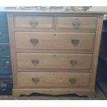 A light oak chest of drawers (W Whiteley). 100 x 104 x 49cm.