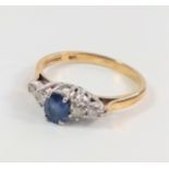 9ct yellow and white gold oval sapphire and diamond ring. Sapphire 0.50ct. RBC diamonds 0.25ct. Size