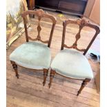 A Pair of Victorian Dining Chairs. With over stuffed seats.