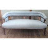 An Edwardian Sheraton sofa. 66 x 135 x 70cm.