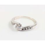 18ct white gold diamond solitaire twist ring with diamond shoulders. Diamonds 0.38ct approx. Size J.
