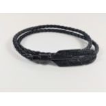 Black feather wraparound bracelet. Doubles as a choker necklace. With magnetic clasp