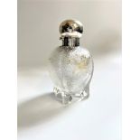 A late Victorian Glass and sterling silver mounted Scent Bottle. London 1896.