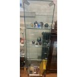 A 20th Century Glass display Cabinet.