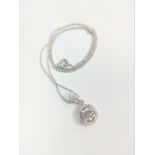 Certificated 18ct white gold diamond halo pendant with diamond bale on a silver chain. Solitaire RBC