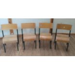 Four vintage primary school chairs