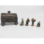 A filigree casket with tiny Chinese figurines