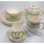 A Crownford Dinner and Tea service with green and gilt decoration (45)