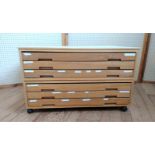 Two sets of paper drawers, each has three drawers, bottom set has casters. 58 x 97 x 76cm overall