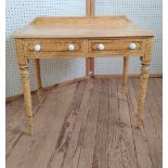 A Victorian/ Edwardian desk. Pine with stained decoration. One broken handle. 74 x 92 x 52cm.