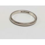 A Platinum wedding ring size N and a half. 3.06 grams.