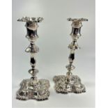 A Pair of George III Style Sterling Silver table Candlesticks.