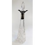 A silver mounted decanter. Of conical form. With Stopper. Sheffield 1931. 43cm high.