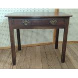 A mahogany side table, one drawer with swing drop pull handles. 70 x 84 x 53cm.