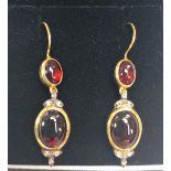 Pair of 9ct yellow gold and silver cabochon garnet and diamond double drop earrings with hook