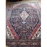 Persian Sarouk hand woven village carpet rich terracotta with duck egg blue. 305cm x 208cm.