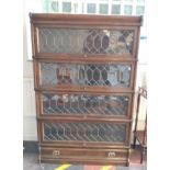 A Globe Wernicke Bookcase. Four sections with leaded glass. 135 x 86 x 27cm.
