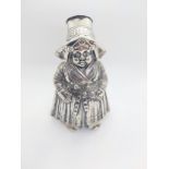 A German 800 standard silver caster of a lady. 19th century. 14cm high. 175gms.