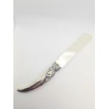 A sterling silver mounted and mother of pearl letter opener. Birmingham 1904.