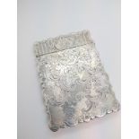 A Victorian sterling silver calling card case Yapp and Woodward. Brimingham 1848 engraved with a