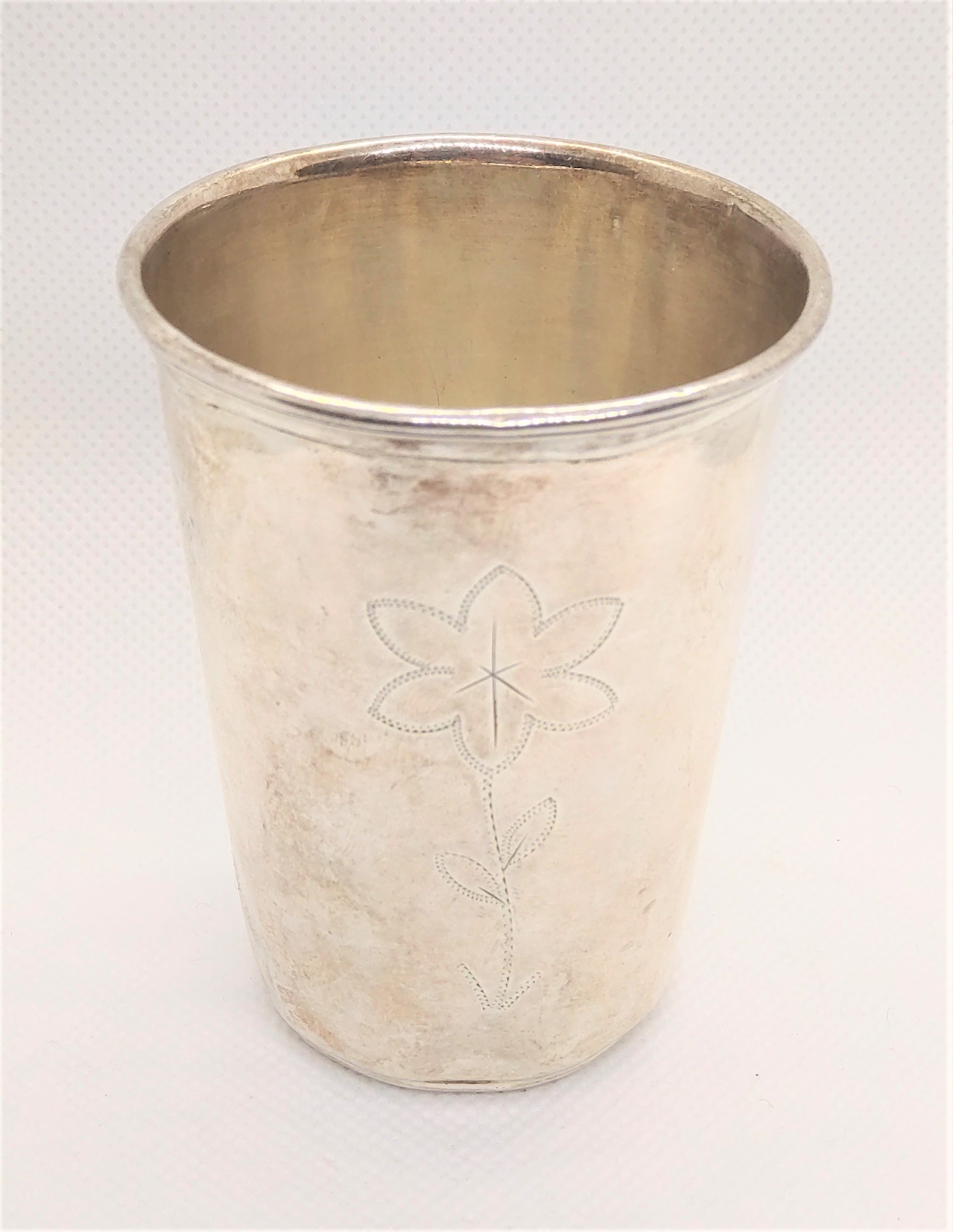 A German sterling silver antique beaker. Circa 1900. 7.5cm high. 38.1gms.
