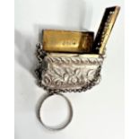 An Early Victorian Sterling Silver Vinaigrette. in the form of a handbag decorated with a view of