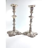 A pair of George II sterling silver table candlesticks London 1754. 24cm high. 1218gms.