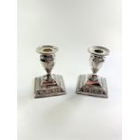 A Pair of Late Victorian Sterling Silver Dwarf Table Candlesticks. Sheffield 1895, loaded. 11.5cm