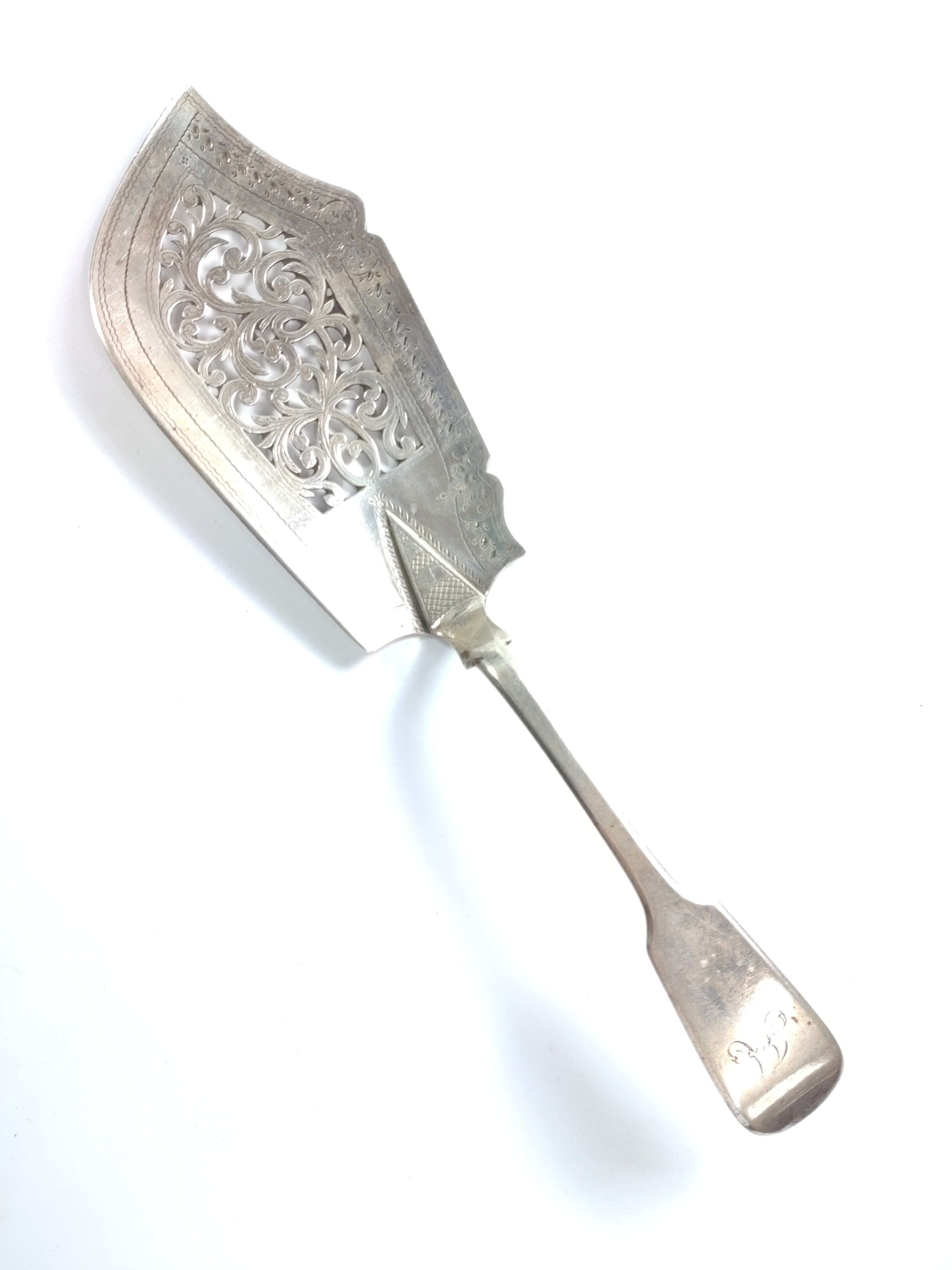 A William IV sterling silver fiddle pattern fish slice. London 1837. 29cm long. 141gms.