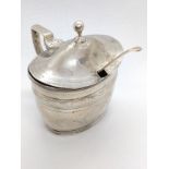 A George III oval mustard pot, London 1803 with an associated mustard spoon 1796. 112gms excluding