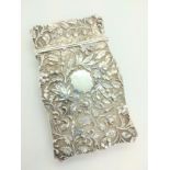 A sterling silver Victorian calling card case. Joseph Whilmore Birmingham 1846. Cast throughout with