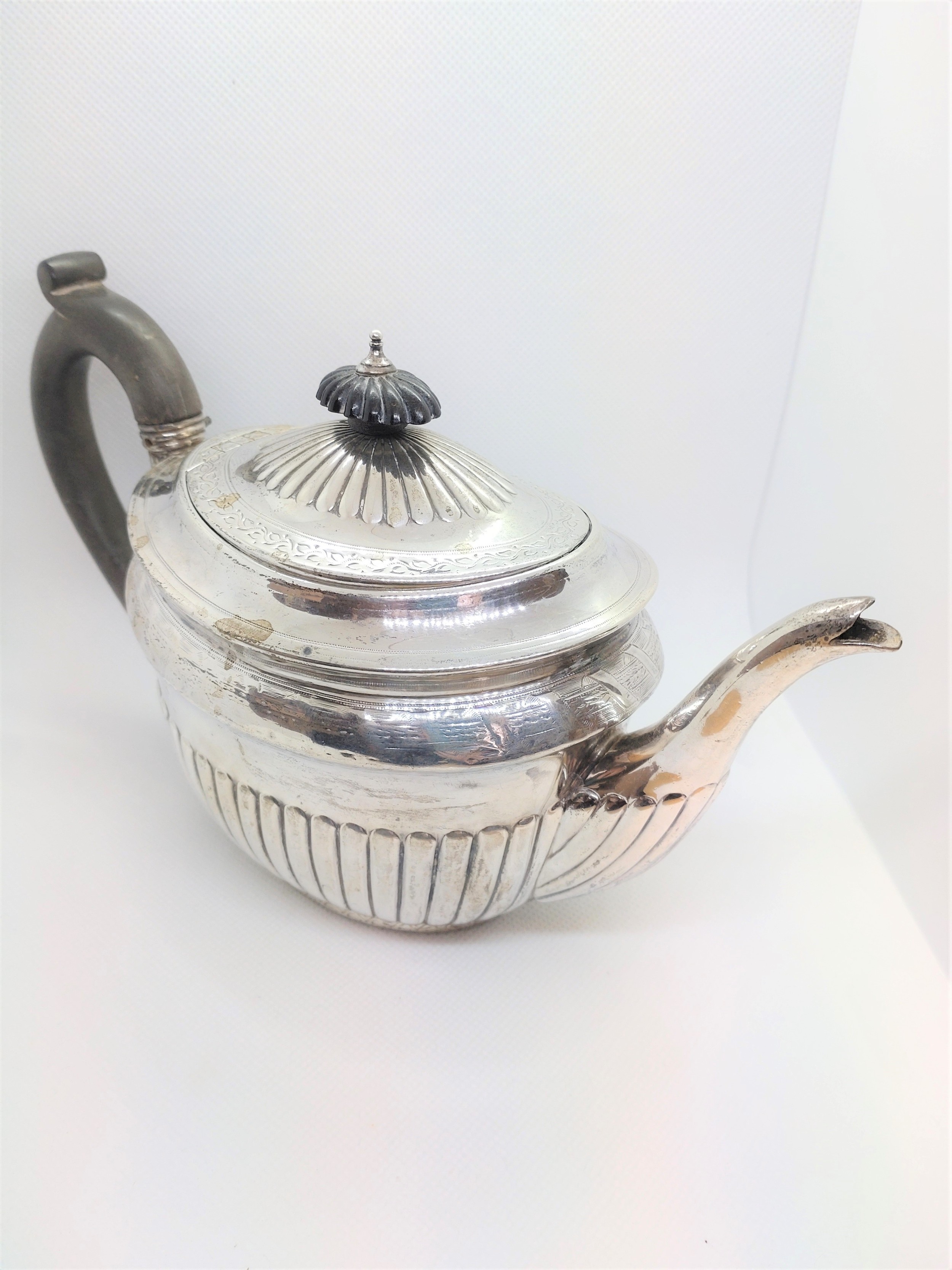 A Victorian sterling silver bachelor teapot London 1882. 343gms (all in)