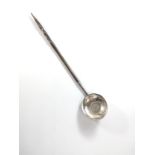 A George III sterling silver toddy ladle with whale bone twist handle. Apparently unmarked but inset