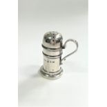 A Late Victorian Miniature Pepperette. Birmingham 1898. The for of a tankard. Scroll handle. 5.5cm